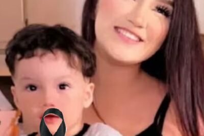 Young woman puts son inside the fir… See more