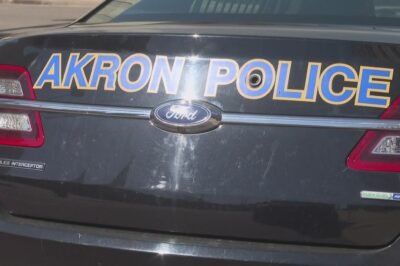 Body found after Akron shed fire behind vacant building