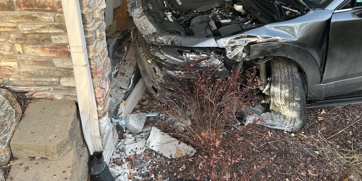 Car crashes into house in West Omaha