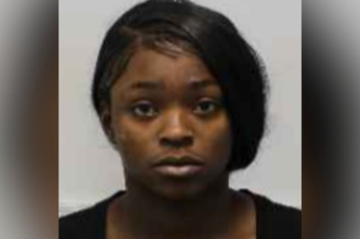 Woman arrested after shooting someone at hotel, police say