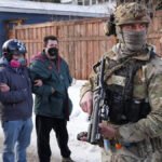 Woman dies after federal agent opens fire on her vehicle amid immigration crackdown