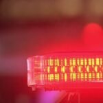 Overnight crash sends two to hospital, one vehicle flipped