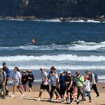 Canadian tourist found dead on Australian beach surrounded by dingoes