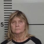 Woman arrested for striking, killing pedestrian